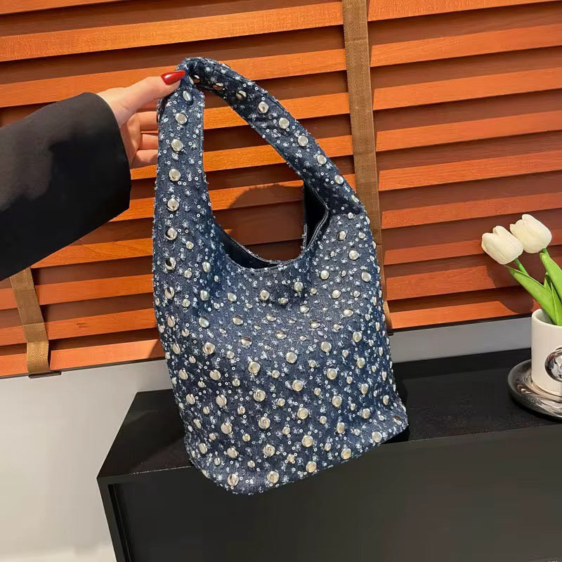 Denim commuting bucket bag