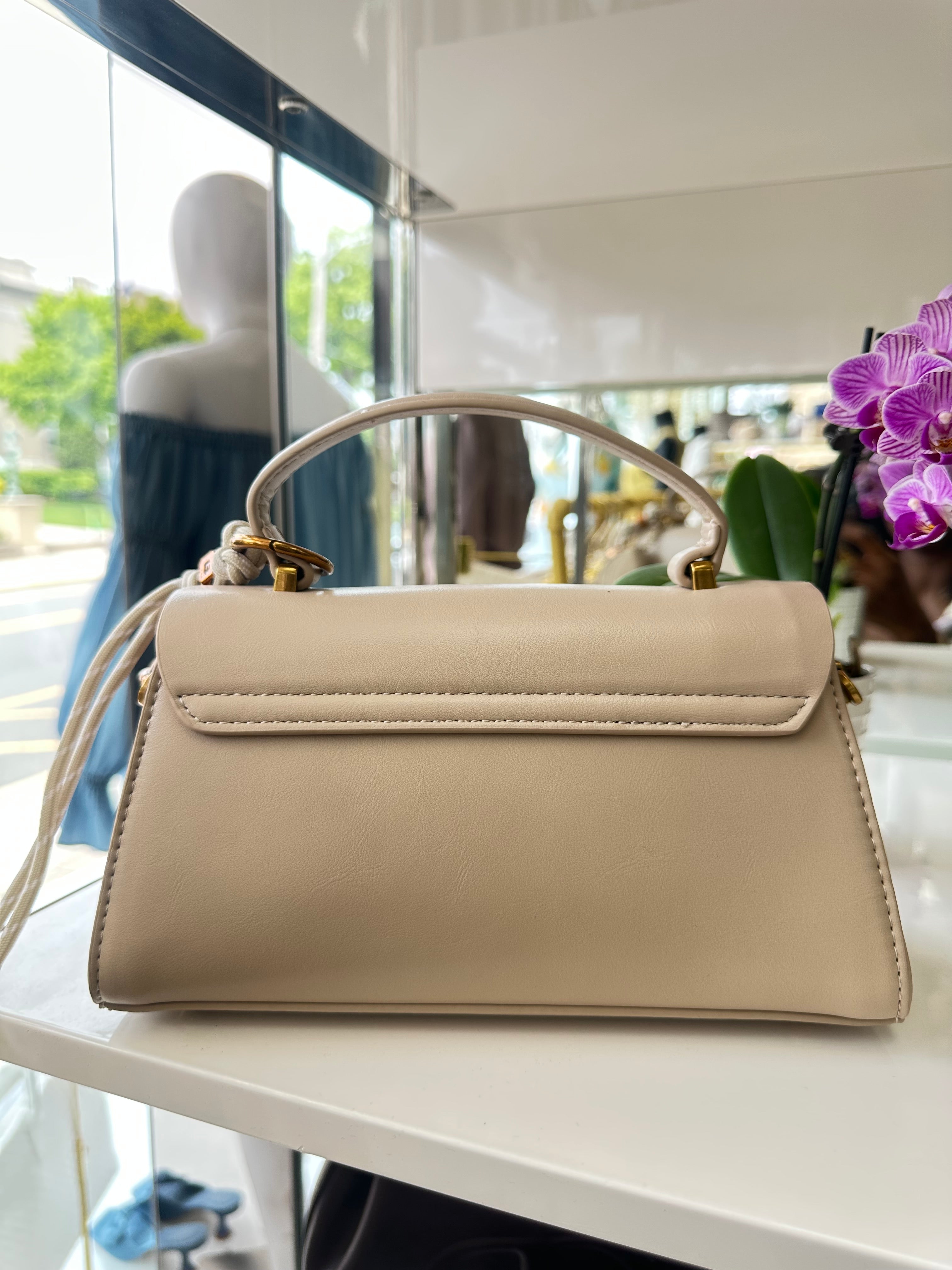 The "Triomphe Charm" Top Handle Satchel