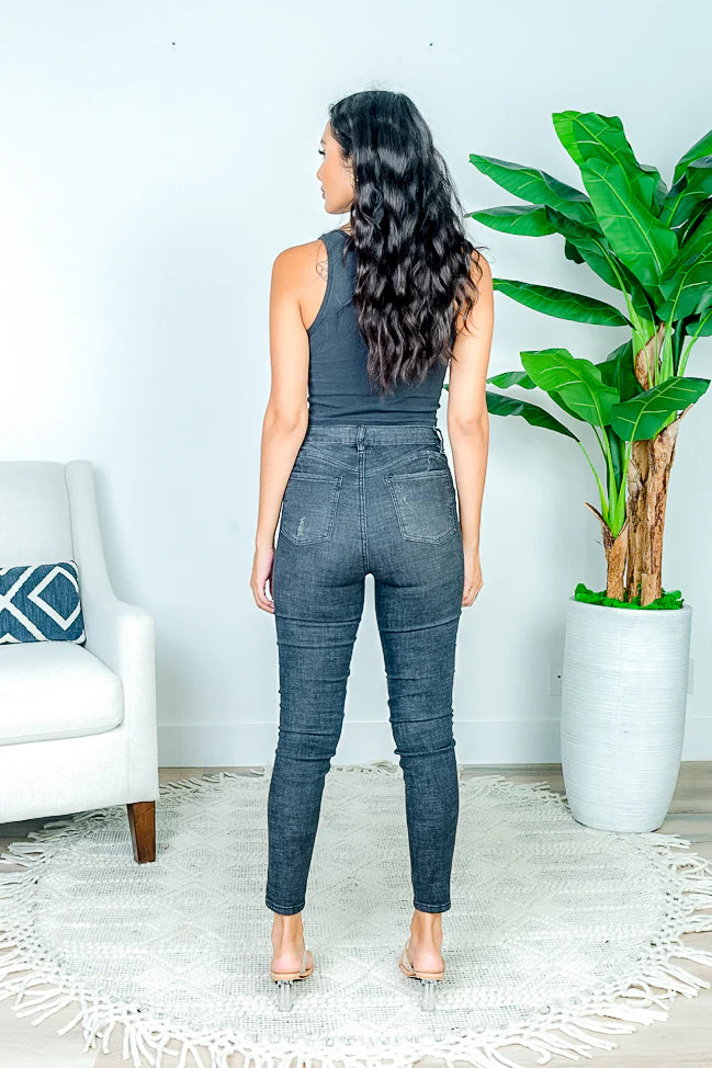 High Waisted Denim Skinny Jeans with 2 Button Fly, Light Distressed Detail along Front Leg in Black/Denim