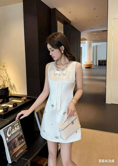The "Bijou Bow" Mini Dress