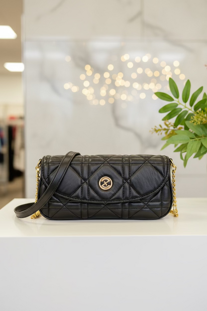 The JANI &amp; TINO Quilted Cylinder Crossbody - Black