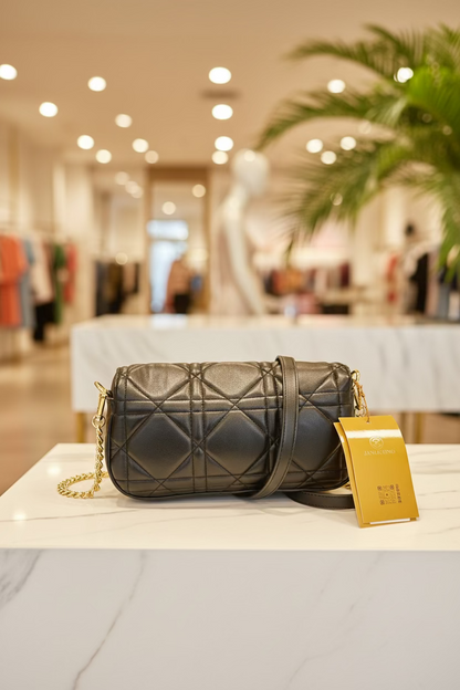 The JANI &amp; TINO Quilted Cylinder Crossbody - Black