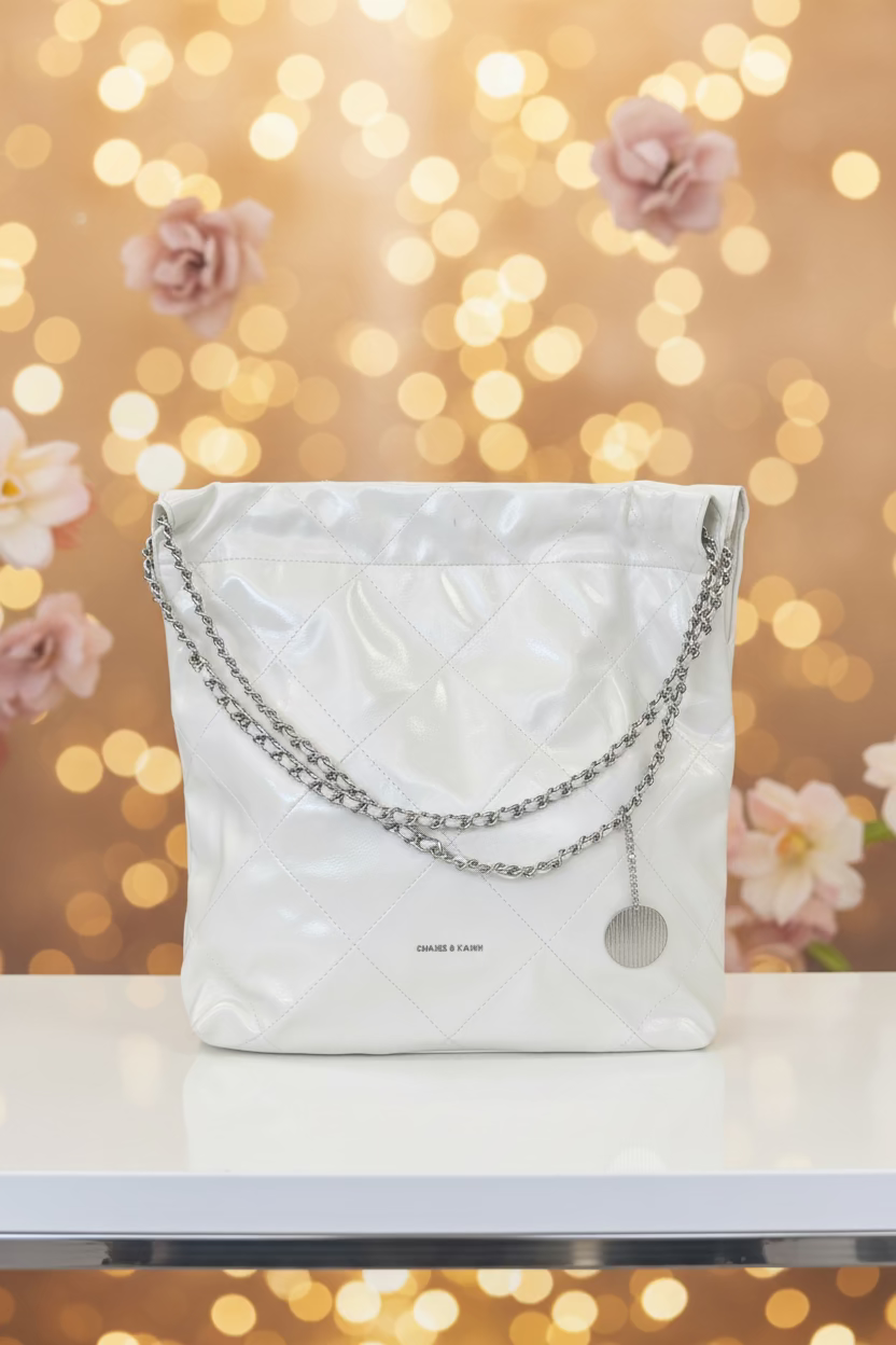 The CLEVER &amp; BEACH Quilted Chain Hobo