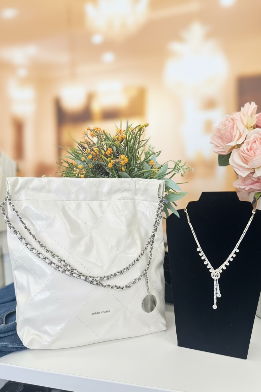The CLEVER &amp; BEACH Quilted Chain Hobo