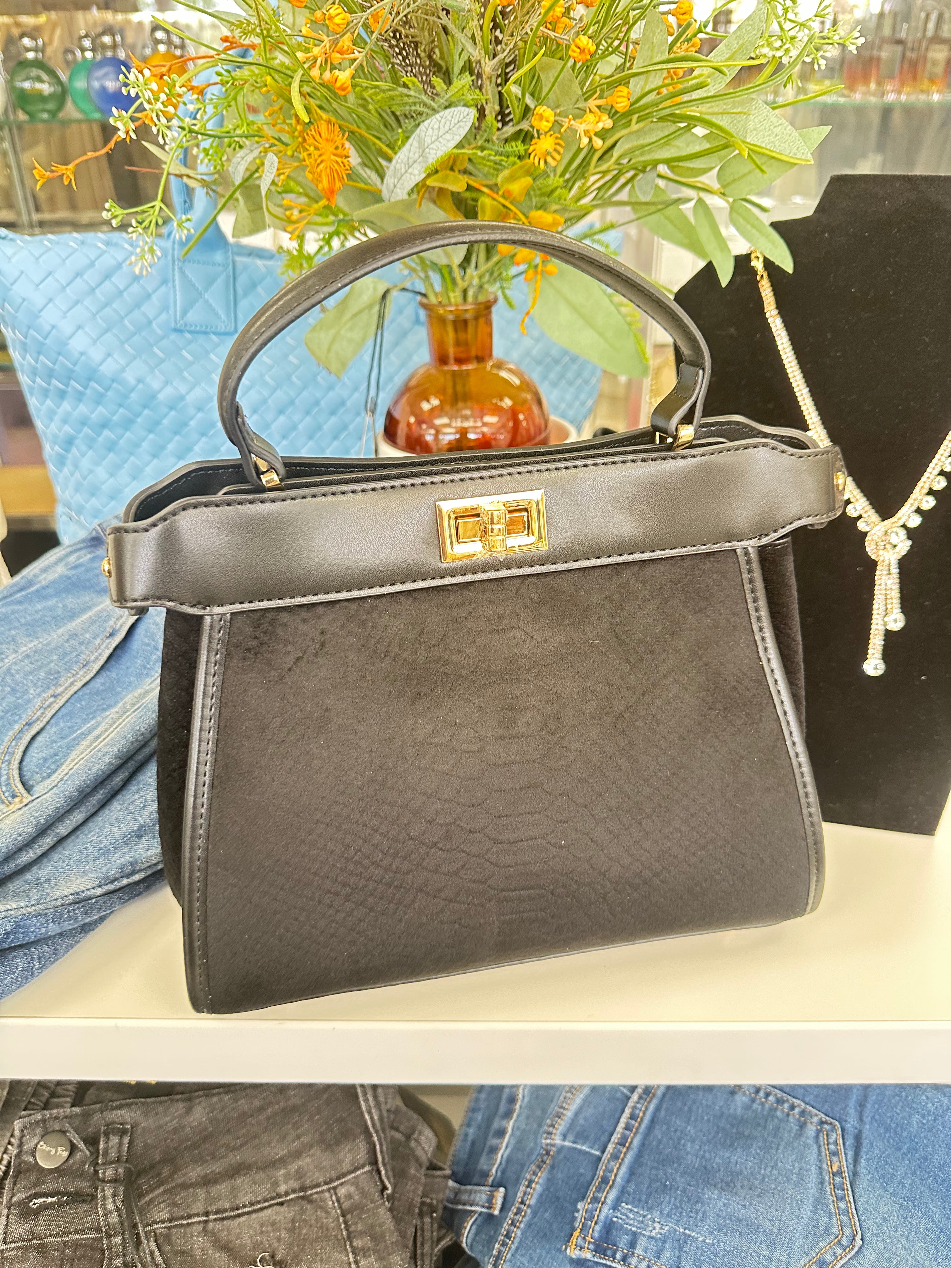 The Peek-A-Boo Luxe Top-Handle Bag