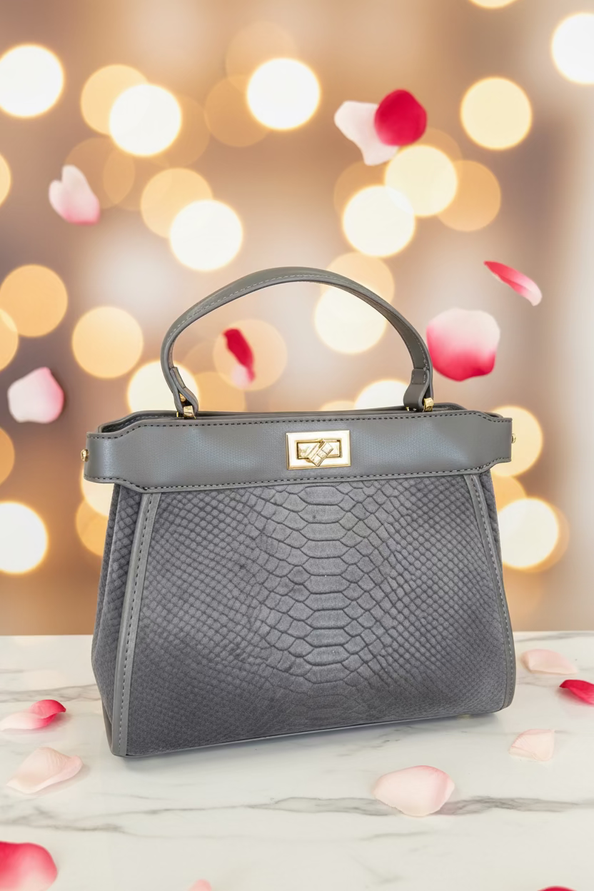 The Peek-A-Boo Luxe Top-Handle Bag