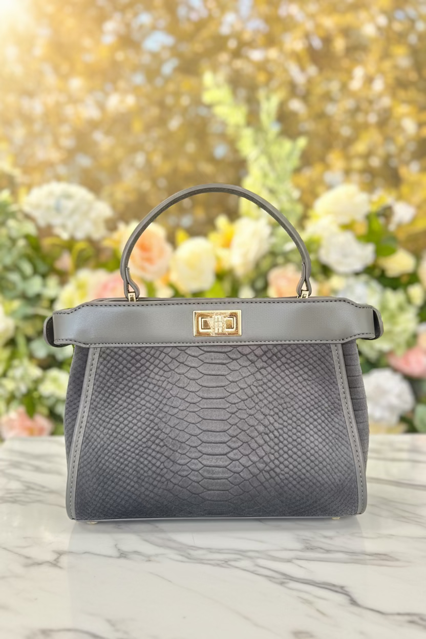 The Peek-A-Boo Luxe Top-Handle Bag