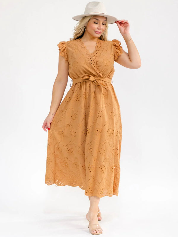 Plus Size Ruffle Sleeve Surplice Elastic Waist Eyelet Maxi Dress in tan worn by a model with a hat.