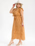Plus Size Ruffle Sleeve Surplice Elastic Waist Eyelet Maxi Dress worn by a model in a tan color with ruffle sleeves.